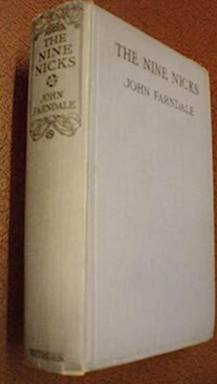 A white book on a brown surface

Description automatically generated